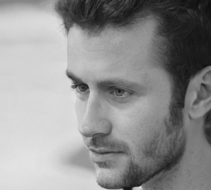 Professional financial counselor Reynold Blackwood in business attire